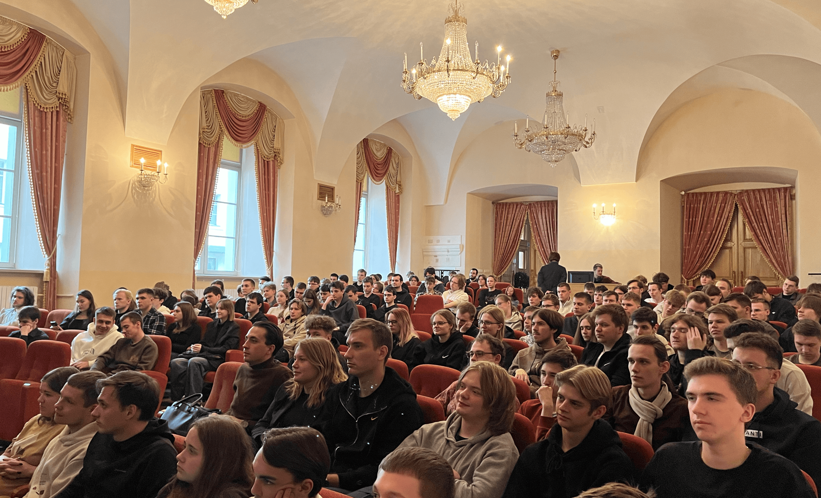 Students are listening to a lecture. Students are listening to a lecture.